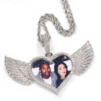 China New Product Environmental Friendly Hip Hop Copper Inlaid Zircon Love Heart Wings Photo Pendant Memory Photo Necklace for sale