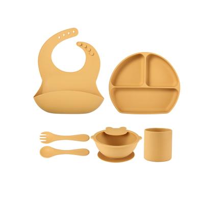 China BPA Free Wholesale Portable Toddler Feeding Baby Tableware Suitable Waterproof Soft Silicone Set Drooling Bib for sale