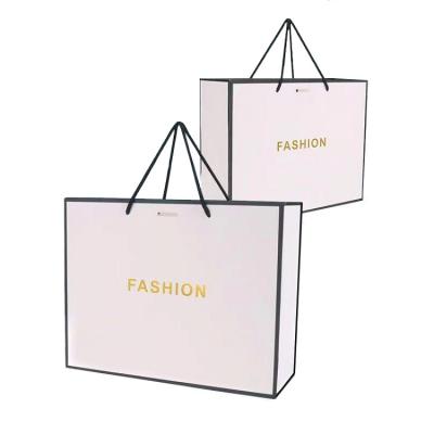 China Best And Cheapest Environmental Protection White Paper Gift Bag Shopping Shopping Paper Bags With Logos for sale