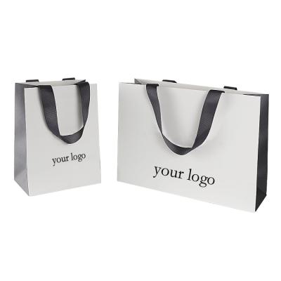 China Recyclable Cardboard Recyclable Custom Paper Bag Hot Stamping Your Own Logo Shopping Bags for sale