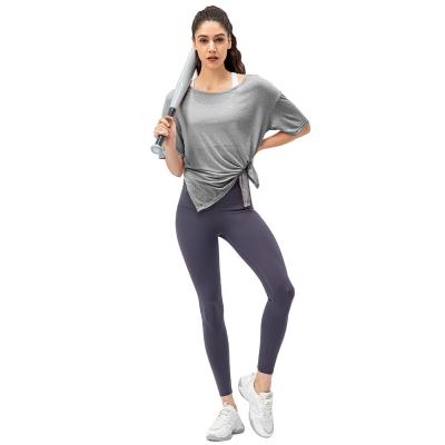 China Hot Selling Breathable QUICK DRY Unique Design Light Weight Loose Running Split Quick Dry Short Sleeves for sale