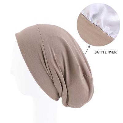 China Good quality comfortable modal hood sleep hat with satin inside the hat for sale