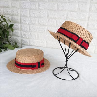 China New Comfy Wear Style Summer Fashion Wheat Straw Hat Straw Flat Top Hat With Red Band for sale