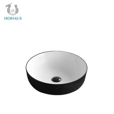 China Ceramic Glazed Bathroom Countertop Basin Round Shaped Hand Wash Basin zu verkaufen