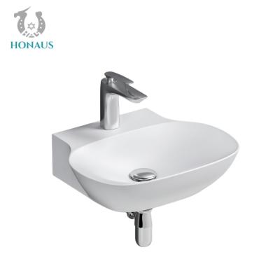 Cina Modern Streamlined Surfaces Bathroom Wall Hung Bain Sink Hand Wash Wall Mounted in vendita