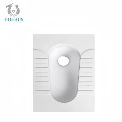 China Lavatory Squatting Pan Toilet Anti Scratch Glaze Anti Slip Front Back Flush Large Pipe for sale