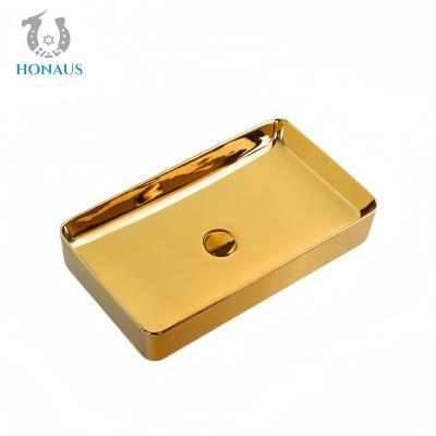 China Luxury Bathroom Countertop Basin Electroplated Gold Ceramic Mirror Surface zu verkaufen