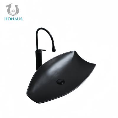 China Luxury Bathroom Countertop Basin High Quality Ceramic Art Design Shape Black for sale