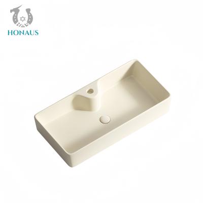 China Luxury Bathroom Countertop Basin Premium Quality Ceramic Cream Modern Fast Drain for sale