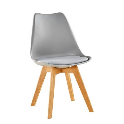 China Modern Whole Home Moden White Wood Wooden Kitchen Leg Dining Chair High Quality Coffee Dining Dining Stacking PP Plastic Chair With W for sale