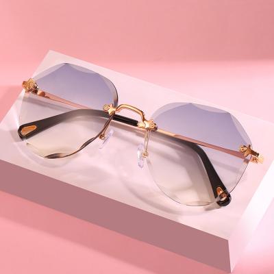 China 15 Years New DOISYER 2021 Experience Diamond Cutting Yellow Rimless Sunglasses Fashionable Metal Frame Glass Frameless Sunglasses for sale