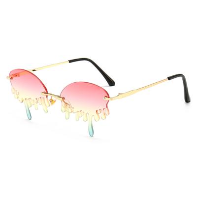 China 15 Years New Experience DOISYER 201 Small Frame Fashionable Women Gold Drip Water Tears Metal Shaped Rimless Sunglasses for sale