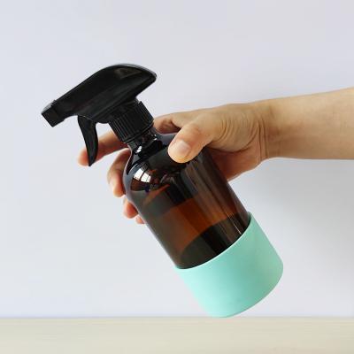 China HomeCare Sale 500ml 16oz Amber Hand Sanitizer Glass Spray Bottle with Trigger Sprayer and Silicone Sleeve for sale