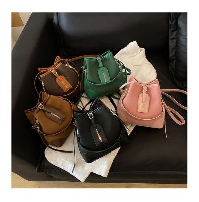 China Luxury Fashion Ladies Bucket Bags 2021 New Fashion Women's Drawstring Contrast Color Shoulder Suede Leather Purses and Handbags Bags for sale