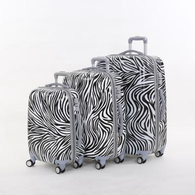 China ABS 20 24 28 Inch 360 Degree Wheels Female PC Zebra Print Fashion 4 Spinners Travel Suitcase Trolley Luggage Sets 3pcs for sale