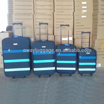 China Polyester Factory Clearance Stock 4pcs Trolley Luggage Suitcase Set External Wheels for sale