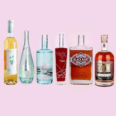 China High quality eco-friendly 750ml 700ml 500ml empty tequila glass customized bottle with screw cap/lid for sale