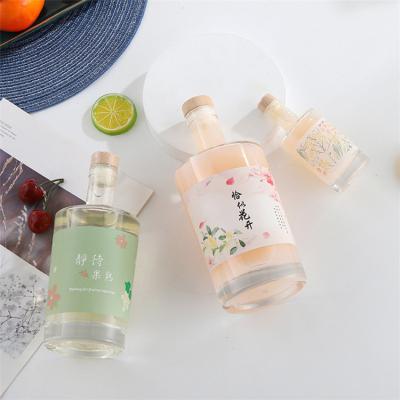 China Eco-Friendly Recyclable All Brand New Factory Direct Custom Frosted Wine Fruit Glass Bottle for sale