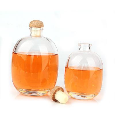 China Order-Friendly 500ML 750ML Flat Clear Glass Wine Bottles For Cider Brandy With Cork for sale