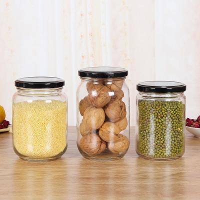 China 50ml 100ml 200ml 250ml 300ml 500ml 750ml 1000ml Beverage Customize Air Tight Glass Storage Container Jar With Metal Lid for sale