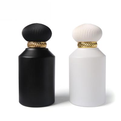 China Cosmetic Refillable Portable Square Empty Glass Bottle Customize Black And White 50ml 100ml Luxury Perfume Bottle for sale