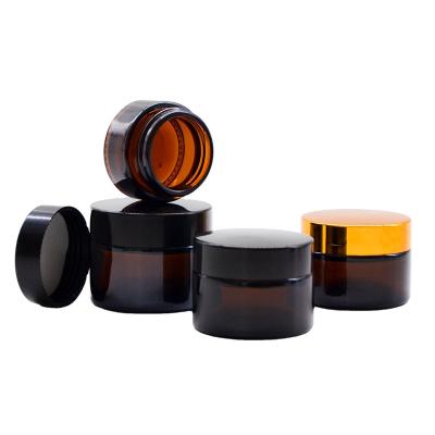 China Wholesale 10ml 20ml 30ml 50ml 50g 100ml Skin Care Body Cream Empty Black Cosmetic Glass Cream Jar With Lid for sale