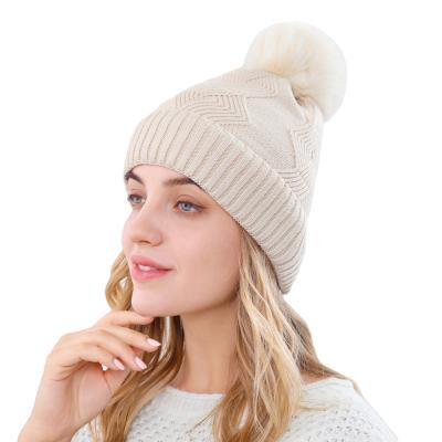 China New JOINT Style 100%acrylic Paint Color Stretch Knitted Winter Women Custom Pom Pom Beanie Hat for sale