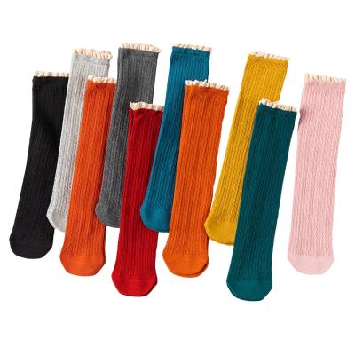 China Soft And Fashionable Sporty Button Spring And Autumn Kid Girls Socks Lace Baby Socks Cotton Tube Girls Children Long Socks for sale