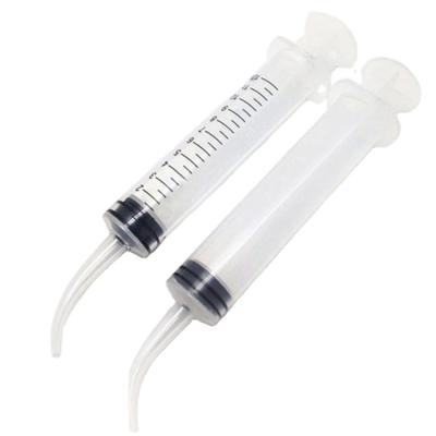 China medical materials & Accessories Curved Disposable Dental Irrigation Syringe Disposable Dental Syringe for sale