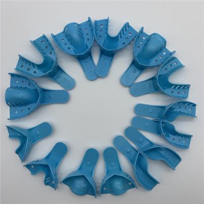 China 14PCS Dental Disposable Teeth Treatment Dental Impression Trays Perforated Biodegradable Plastic Autoclave PP Teeth Impression Trays for sale