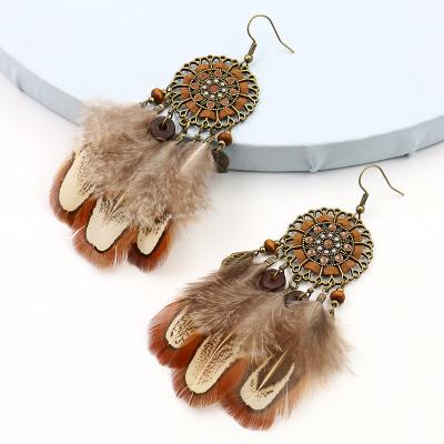 China High quality BOHEMIA products fashion retro long feather drop earrings weaving earrings for sale