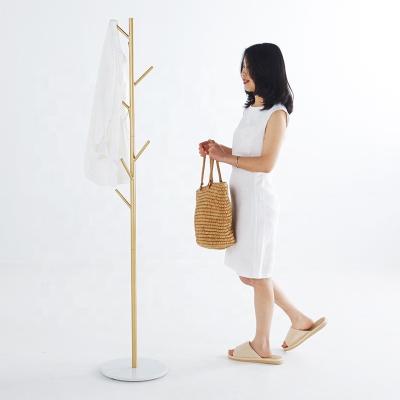 China (Other) Wholesale Price OEM Adjustable Diaper Rack Metal Painting Hat Floor Position Hanger Diaper Rack for sale