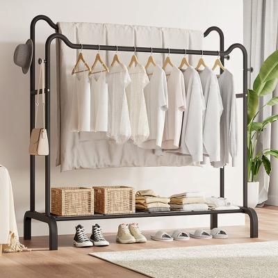 China Modern Deign Wholesale Custom Portable Metal Floor Hangers Bedroom Clothes Coat Standing Hanging Racks for sale