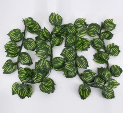 China Eco-friendly Artificial Green Wall Plant Artificial Palm Tree Leaves Indoor And Outdoor Decor for sale