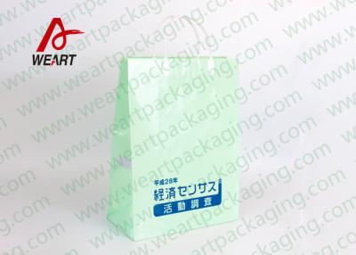 中国 プラスチックが付いているカスタマイズされたアート ペーパー袋は貯蔵のためのロゴの印刷を扱います 販売のため