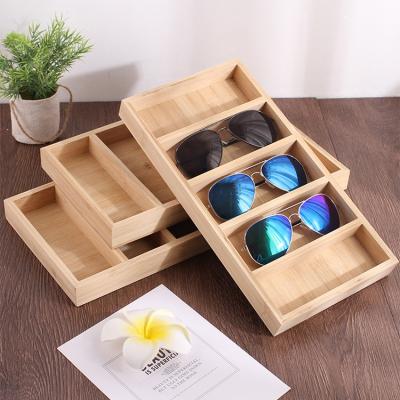 China Hot Creative Bamboo Tray Eco-Friendly Glasses Shelf Fashion Store Fashion Sunglasses Display Stand for sale