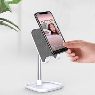 China 35 Degree Stainless Steel Universal Metal Adjustable Desktop Stand Cell Phone Lazy Holder for Protective Tablet for sale