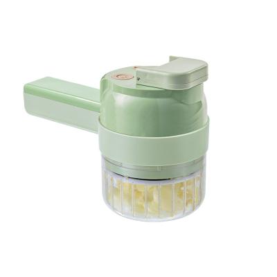 China Hotel Manufacturer 4 in 1 Handheld Electric Vegetable Cutter Kit Wireless Food Choppers Garlic Vegetable Chopper Slicer With Brush for sale