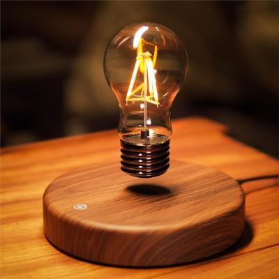 China Room Decoration Burlywood Magnetic Levitation Lamp Floating Light Bulb Desk Lamp for sale