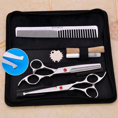 China Pet Products Safety Stainless Steel Shears Tools Durable Top Rated Curved Curved Scissors With Plastic Comb for sale