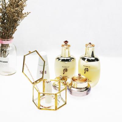 China Luxury Glass Acrylic Gold Metal Storage Organizer Crown Jewelry Box Gift Packaging Bracelet Necklace Ring Jewelry Box for sale