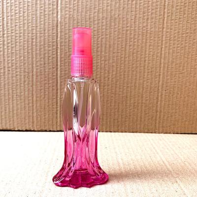 China 15ml 20ML Perfume Bottles Recyclable Unique Fishtail Shape Glass Cosmetic Vial Customized Glass Vial With Sprayer for sale