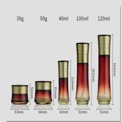 Chine Bouteilles privées d'air en verre de pompe de couleur de gradient, pots ISO9001 30g en verre Lidded à vendre