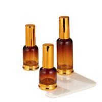 China Amber Gradient Color Cosmetic Glass Bottle With Pump 15ml 30ml 50ml Non Toxic for sale