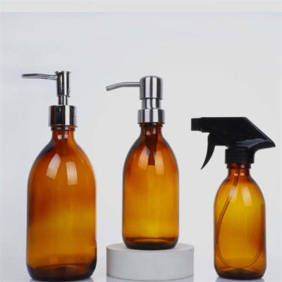 China Amber Glass Bottle Soap Dispenser de pouco peso impermeável com bomba do metal engrossou à venda