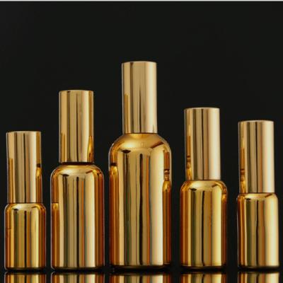 China Gold Airless Pump Cosmetic Glass Bottle Reusable Lightweight 5ml 30ml 50ml 100ml for sale