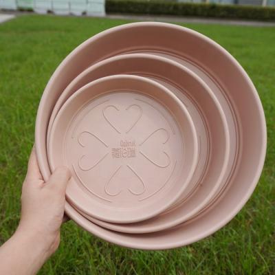 China Round Slim Thick Carry Drain Flower Drip Tray Red Plastic Plant Pot With Saucer for sale