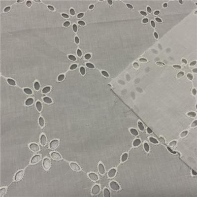 China Viable cheap soft white floral guipure lace eyelet cotton cotton embroidery fabric for dress for sale