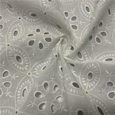 China New Design Viable White Organic 100 Cotton Floral Lace Eyelet Embroidery Guipure Lace Fabric With Holes for sale