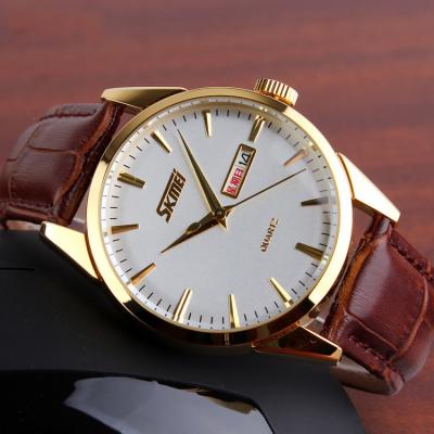 China Automatic Date SKMEI 9073 Couple Quartz Watch Guangzhou China Manufacturer Lovers Watch Quartz Leather Watch for sale